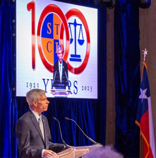 President and Dean Michael F. Barry presenting "STCL at 100" address